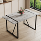 A minimalist retro rectangular dining table with a specially textured top and black metal legs.Contemporary Minimalist MDF Gray Textured Tabletop.Able To Give People A Visual Beauty With Rules.