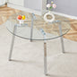 Modern Luxurious Round Tempered Glass Dining Table with silver 7-Shaped Metal Legs,suitable for family meals, office conferences, or as a casual coffee table for various occasions.47.3*47.3*29.5